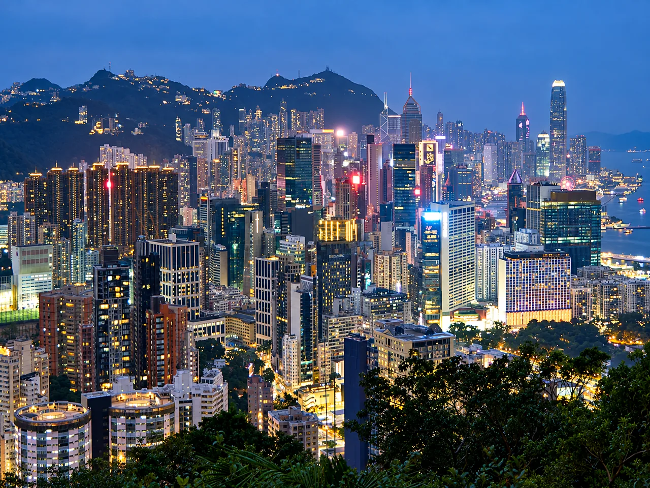 Hong Kong city skyline at dusk.